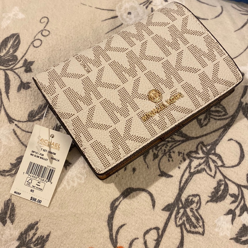 Jet set charm wallet
